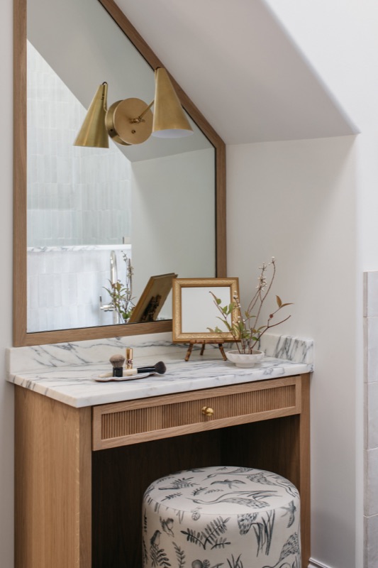 Makeup vanity tucked beneath the eaves · Bathroom Renovations by Leah Phillips Interiors