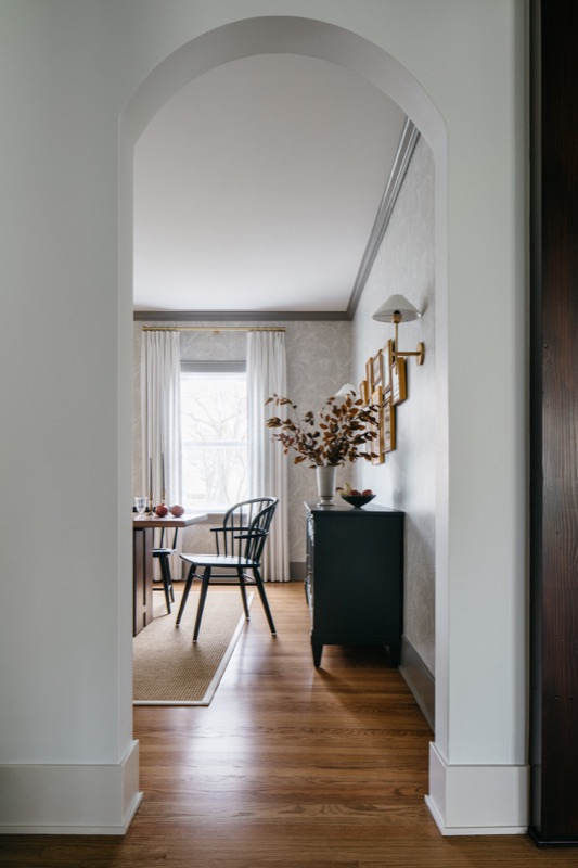 Arched hall view into the dining nook · Downers Grove Main Level Renovation by Leah Phillips Interiors