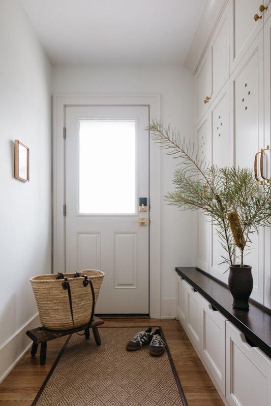 Mudroom entry with console and shoe storage · Downers Grove Main Level Renovation by Leah Phillips Interiors