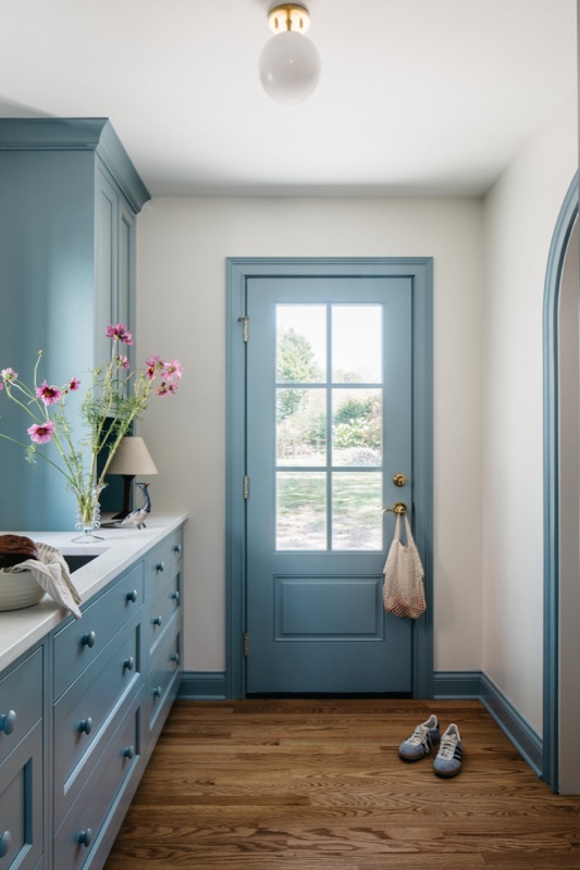 Dutch door painted French blue at the family entry · Glen Ellyn Kitchen & Bathroom Renovation by Leah Phillips Interiors