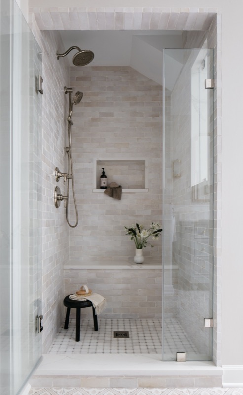 Marble walk-in shower with glass door and mosaic floor · Glen Ellyn Primary Bathroom Renovation