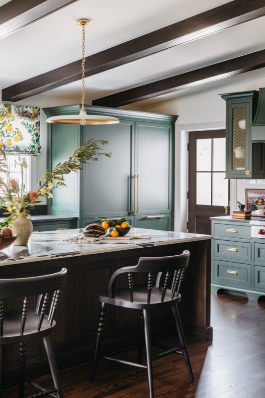 Kitchen island with black windsor stools and brass pendants · Glenview Kitchen Addition & Renovation by Leah Phillips Interiors