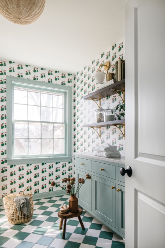 Laundry with green shelving and block print wallpaper · Glenview Kitchen Addition & Renovation by Leah Phillips Interiors