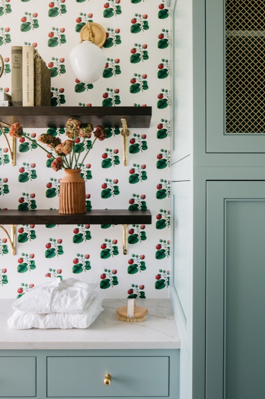Laundry detail with patterned wallpaper and open shelf · Glenview Kitchen Addition & Renovation by Leah Phillips Interiors