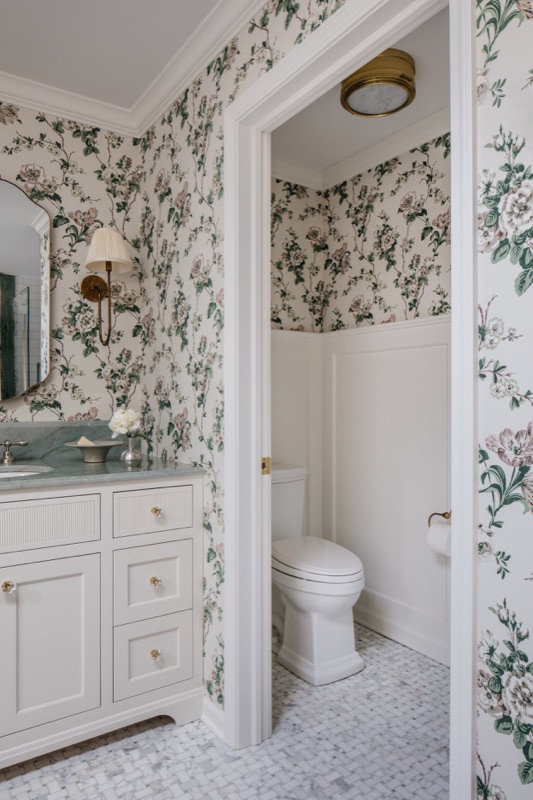 Hall view into the primary bath water closet · Glenview Main Level Renovation by Leah Phillips Interiors