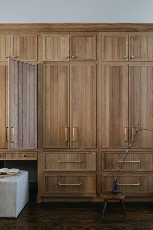 Full white oak cabinet wall with integrated refrigerator · Lincoln Park Main Level Renovation by Leah Phillips Interiors